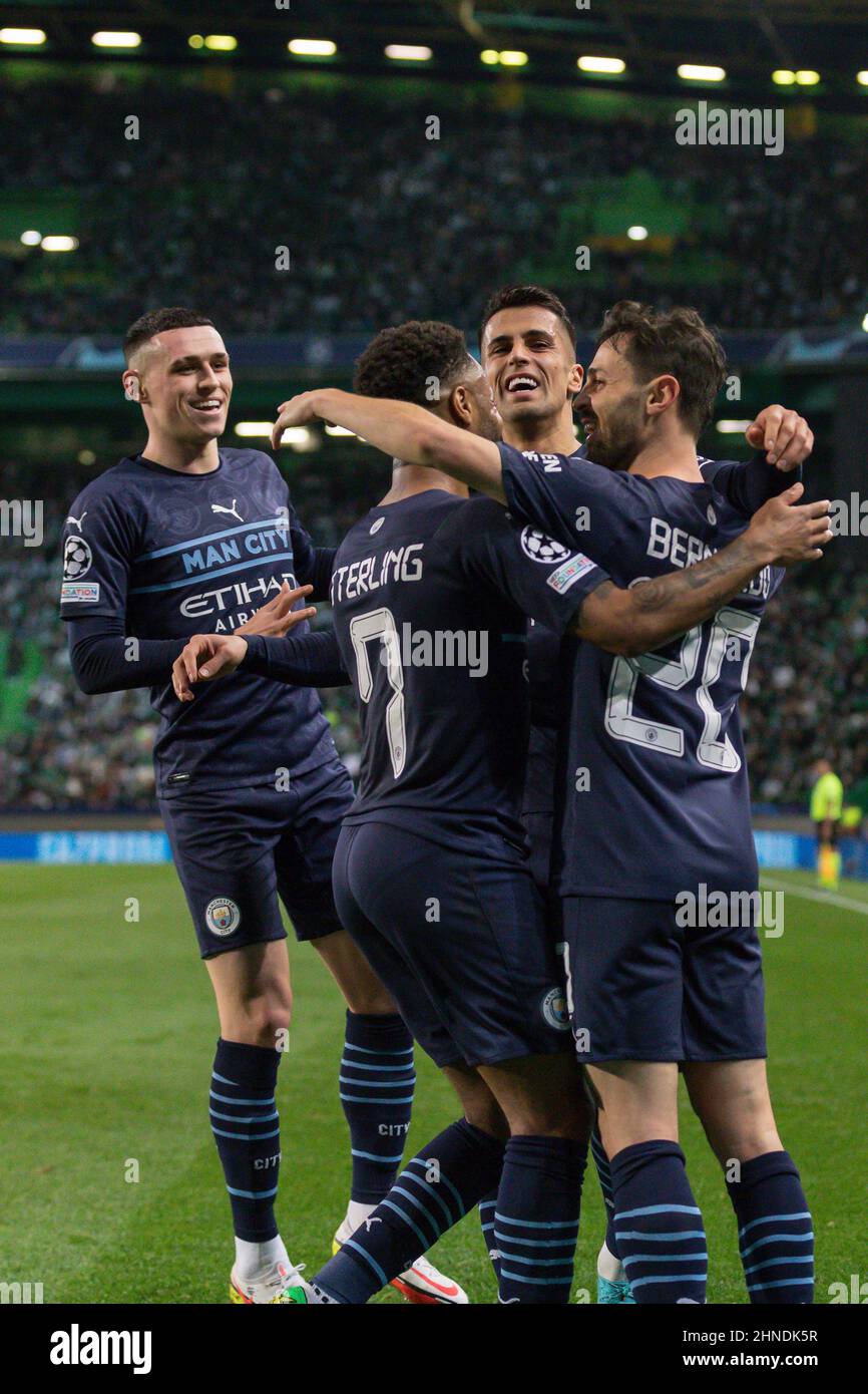 February 15, 2022. Lisbon, Portugal. Manchester City's midfielder from Portugal Bernardo Silva (20) celebrating with teammates after scoring a goal during the game of the First Leg of Round of 16 for the UEFA Champions League, Sporting vs Manchester City Credit: Alexandre de Sousa/Alamy Live News Stock Photo