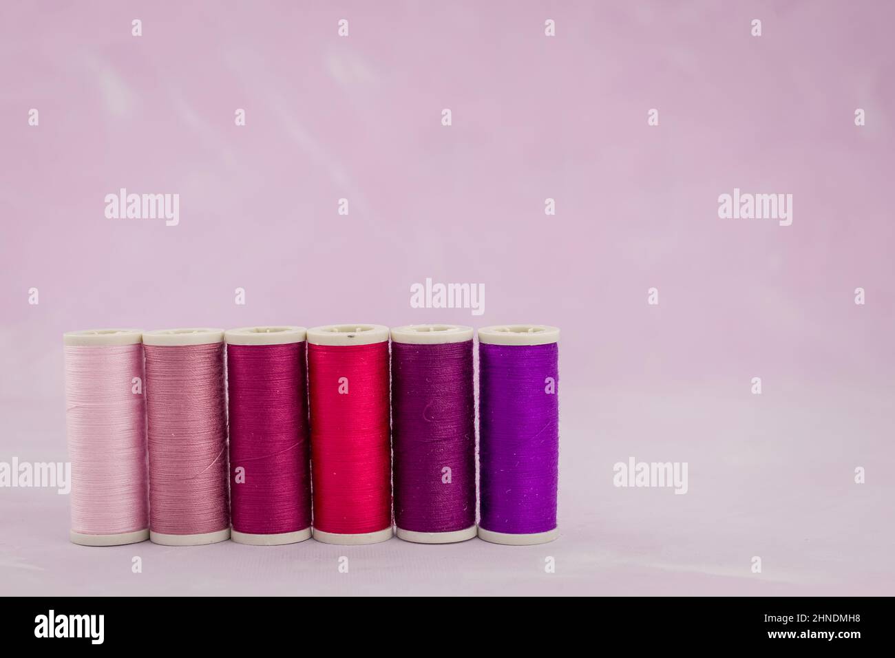 colourful threads background Stock Photo - Alamy