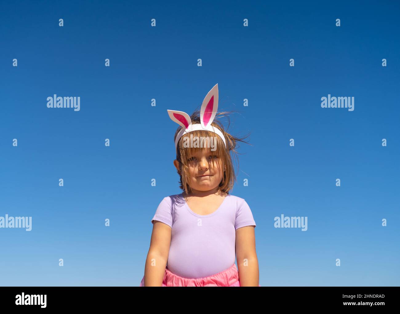 Little girl in bunny ears Stock Photo