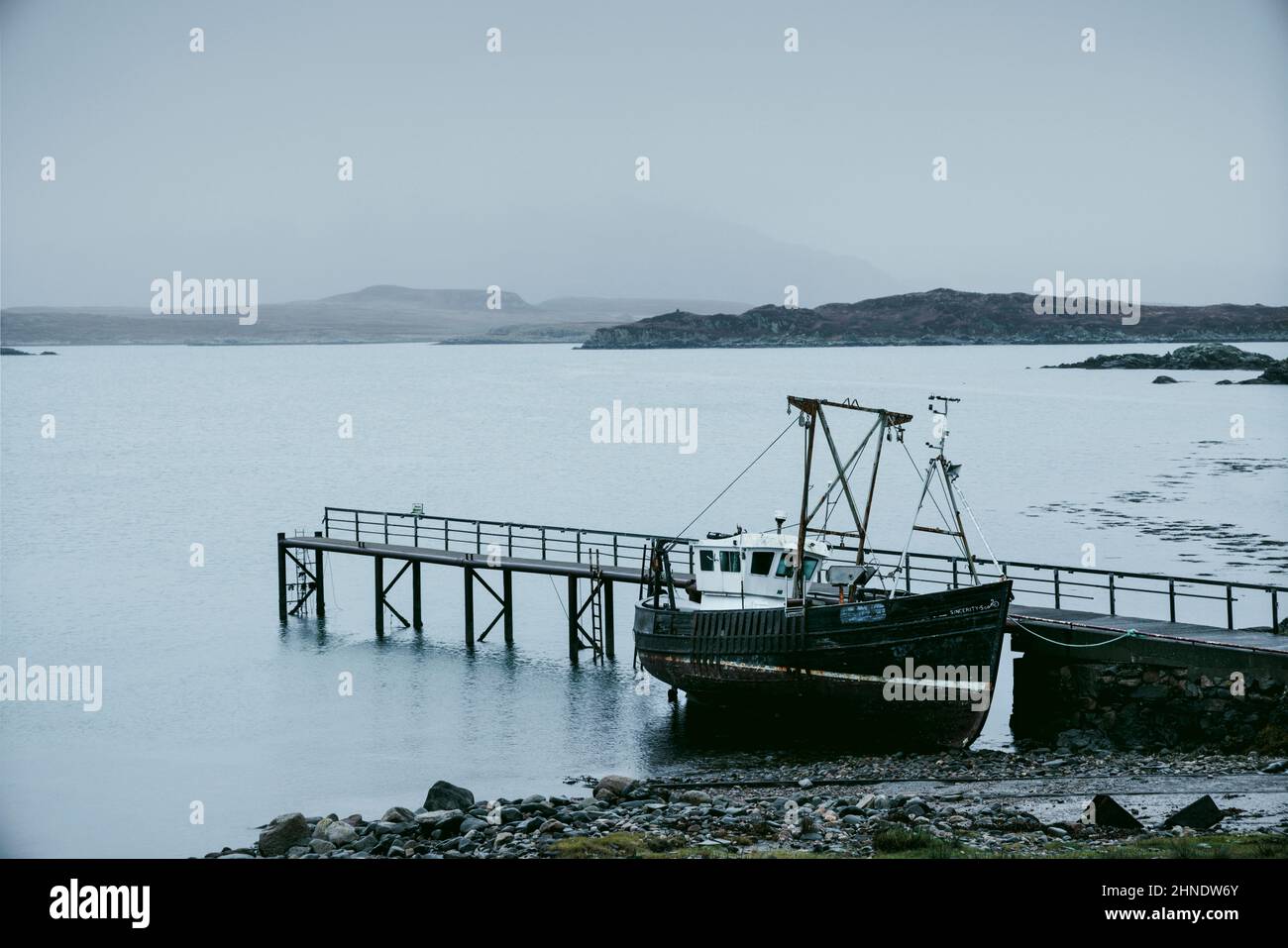 An old, rusty fishing boat on the Isle of Mull, Scotland Stock Photo ...