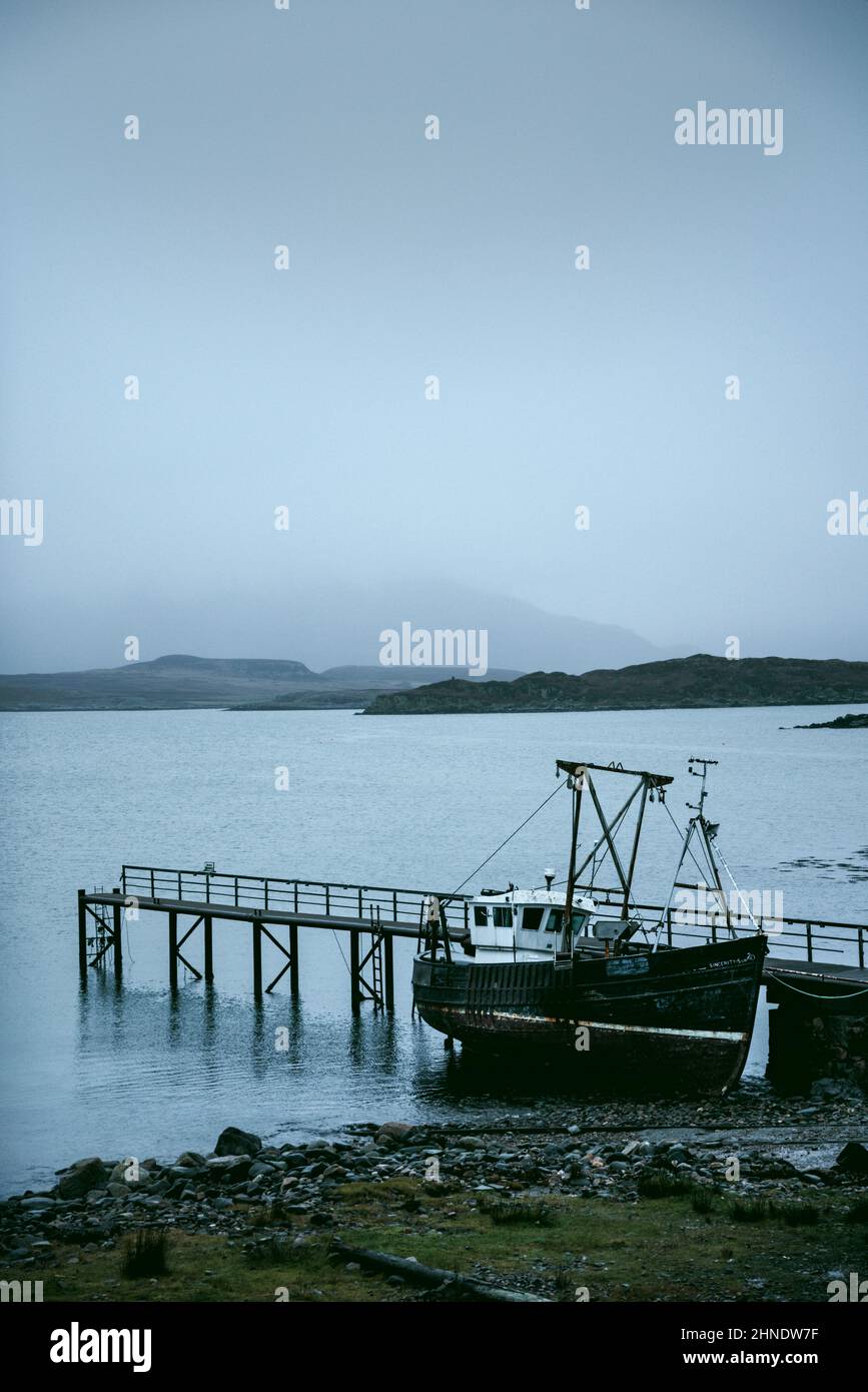 An old, rusty fishing boat on the Isle of Mull, Scotland Stock Photo ...