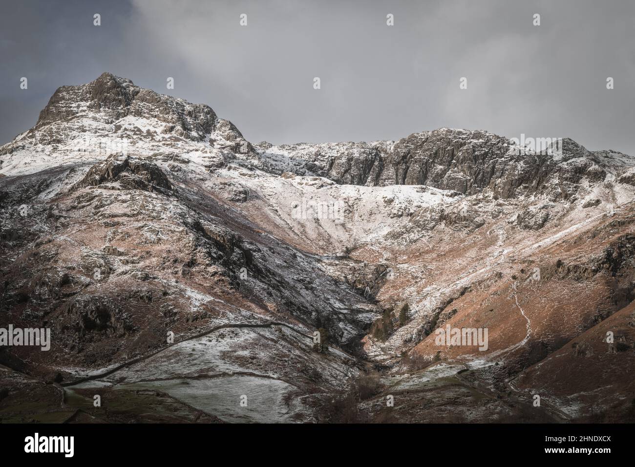 Langdale Pikes above Stickle Gill with a dusting of snow Stock Photo
