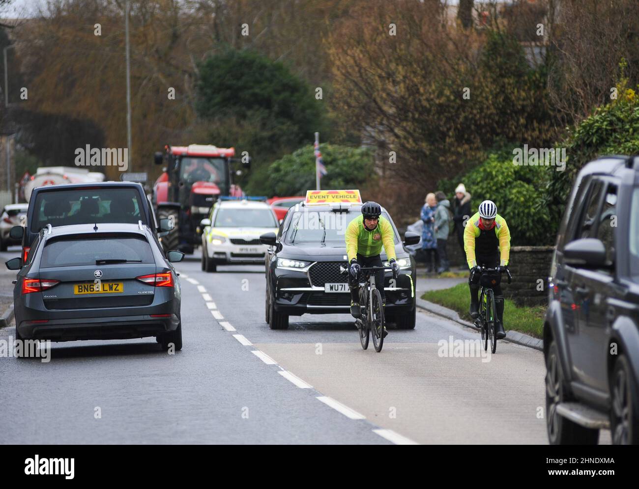 Winterbourne Abbas, Dorset, UK. 16th February 2022. Olympic gold medalists Tom Daley stops for lunch after 7 hours of riding on day 3 of his Comic Relief Hell of a Homecoming Challenge from the Queen Elizabeth Olympic Park in London to his hometown of Plymouth in Devon. On this leg he is cycling 130 miles from Southampton to Bovey Castle on Dartmoor in Devon. Credit: David Partridge / Alamy Live News Stock Photo