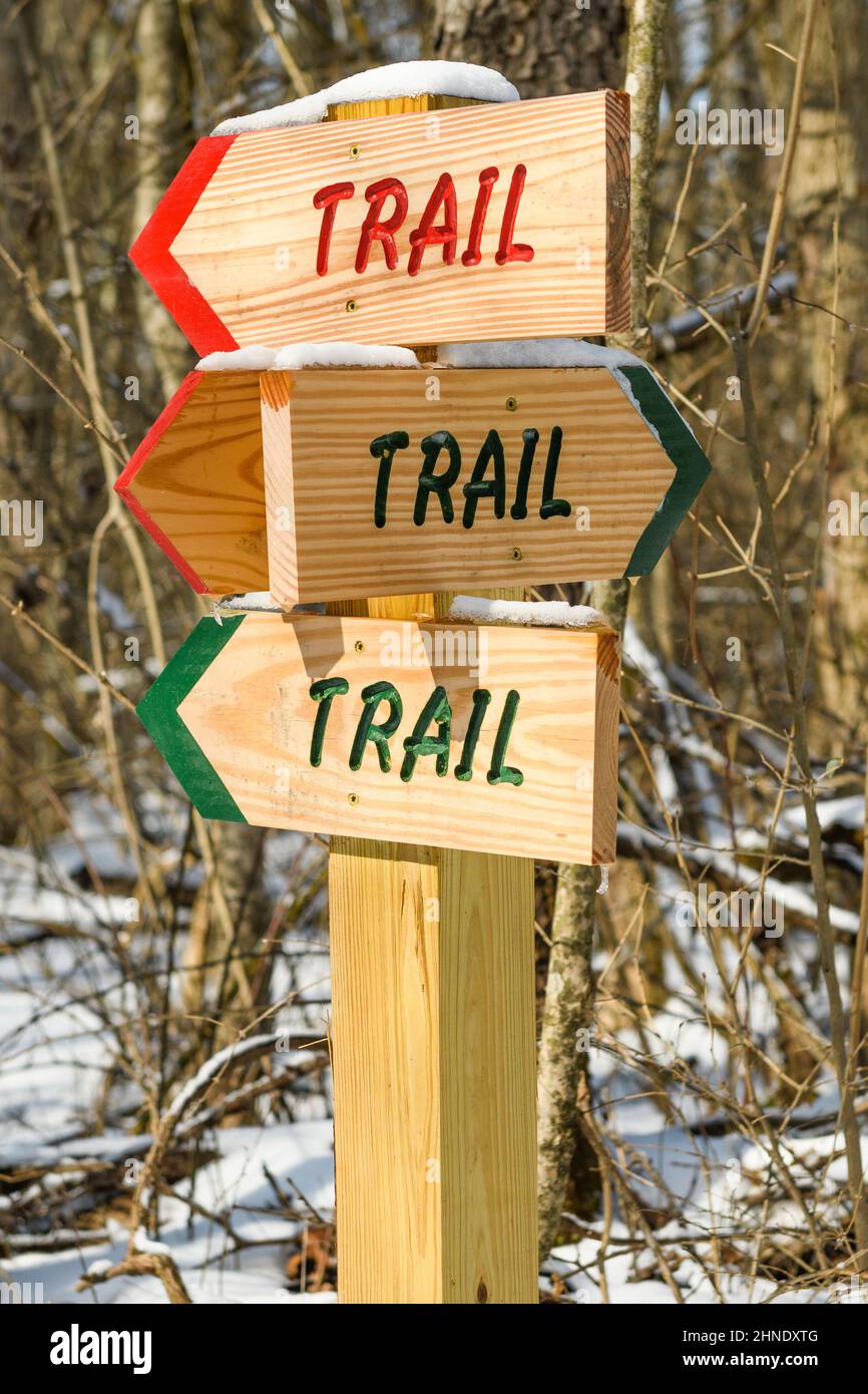Colorful wooden trail signs Stock Photo - Alamy
