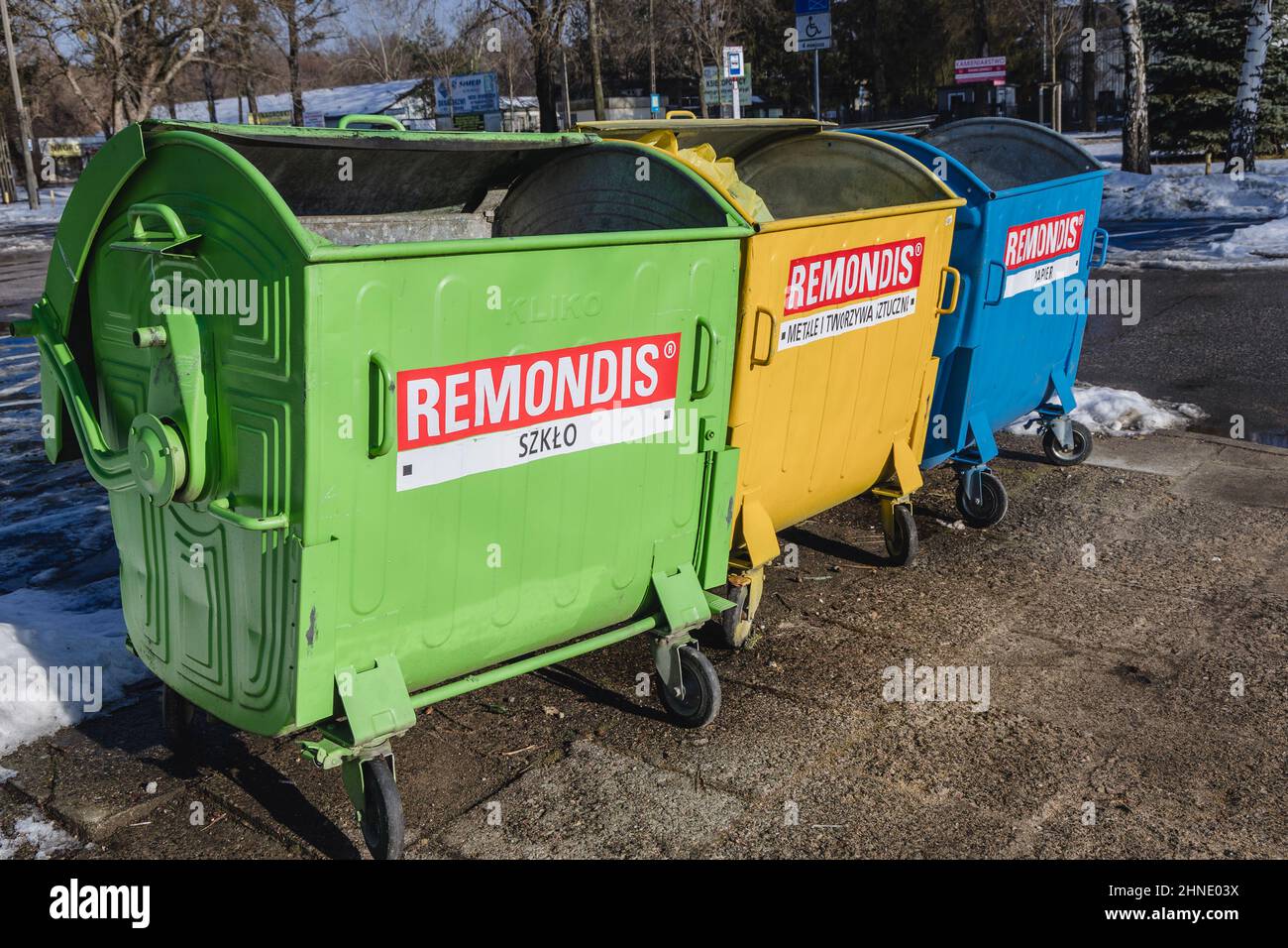 Recycling containers next to cemetery in Warsaw, Poland Stock Photo