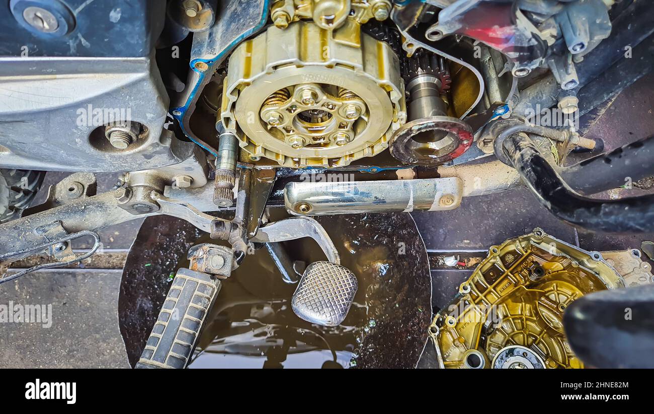 motorcycle engine clutch plate mechanism from flat angle Stock Photo