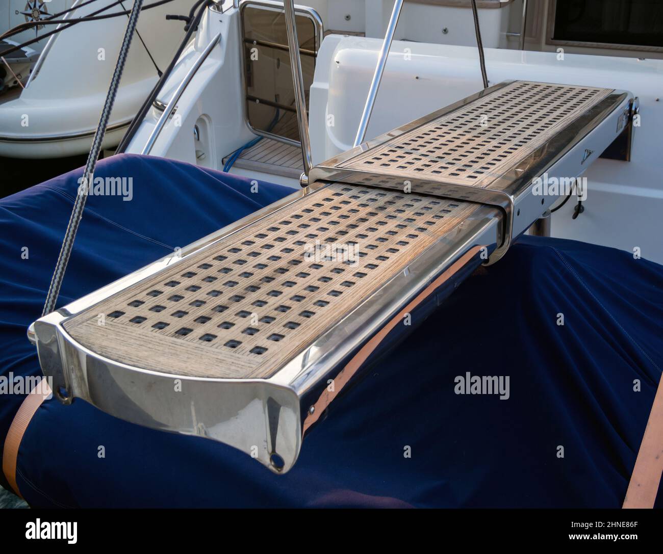 Retractable ship gangway on a yacht Stock Photo