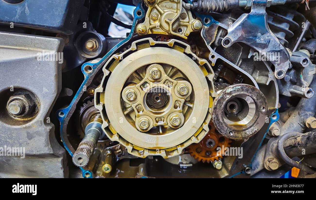 motorcycle engine clutch plate mechanism from flat angle Stock Photo