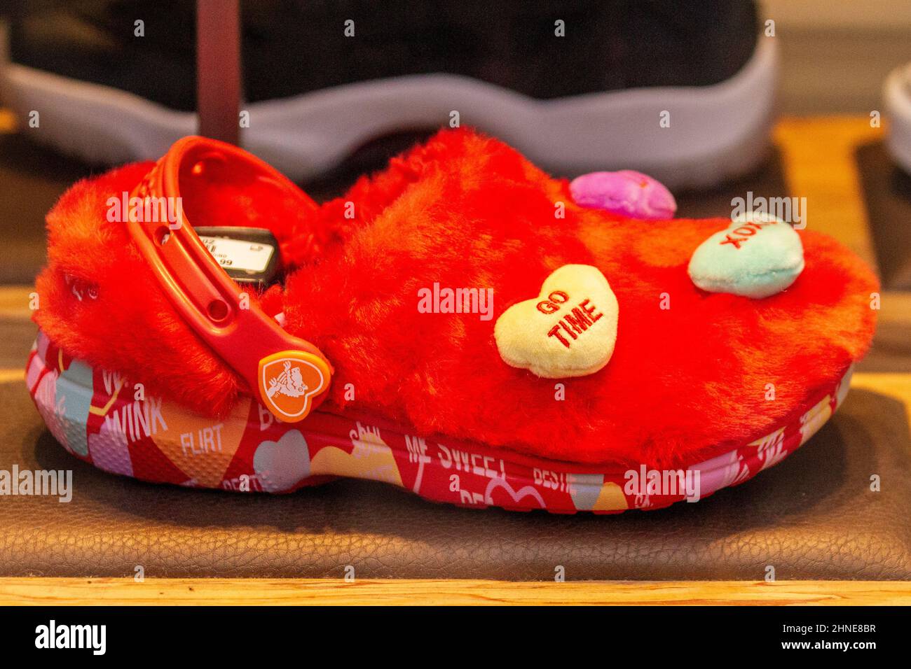 Red Vapour Max trainers in footwear shop inPreston UK Weather;    Sale Shops signs, shoppers shopping in the north-west town centre. Stock Photo