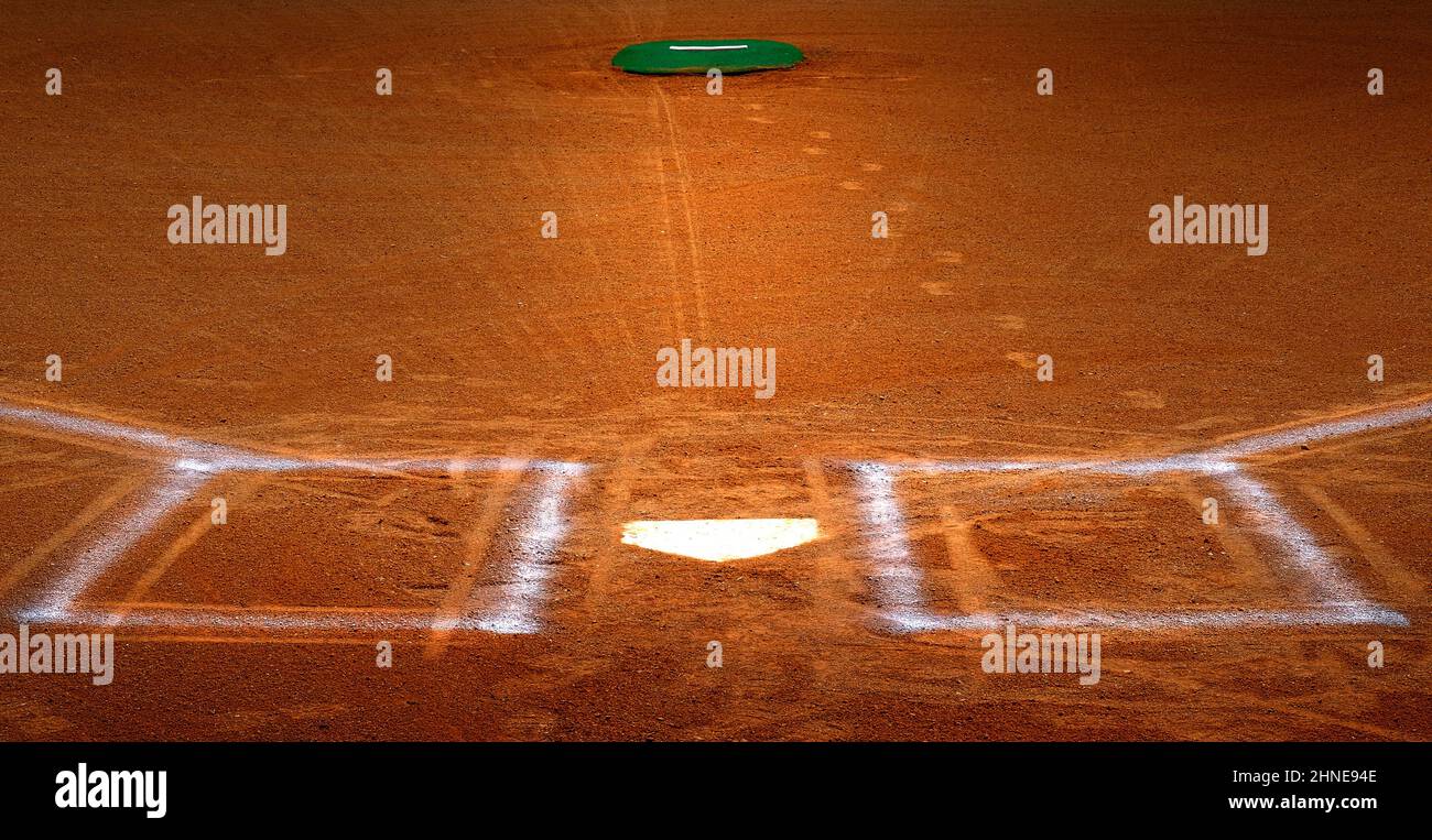 Baseball homeplate with batter box chalk lines in brown clay dirt Stock Photo Alamy