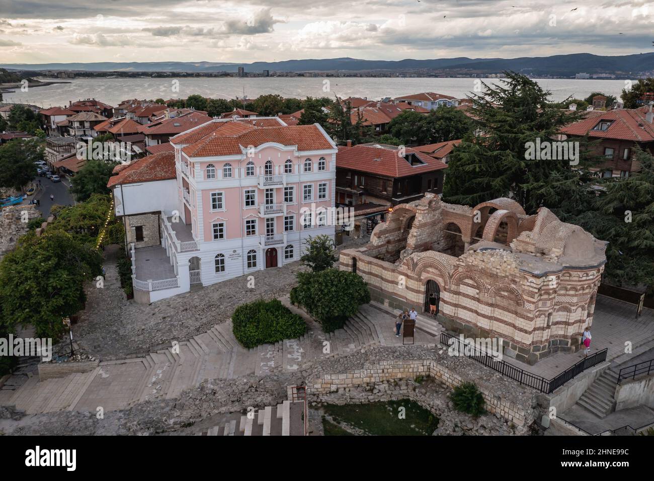Ruins of 14 th century Church of St John Aliturgetos and Municipality building in historic part of Nesebar resort on the Black Sea coast, located in B Stock Photo