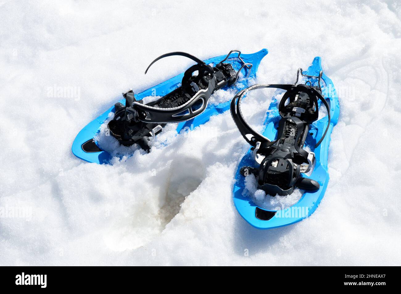 Snowshoes for walking on the snow and hiking on the snowy mountains during winter. Stock Photo