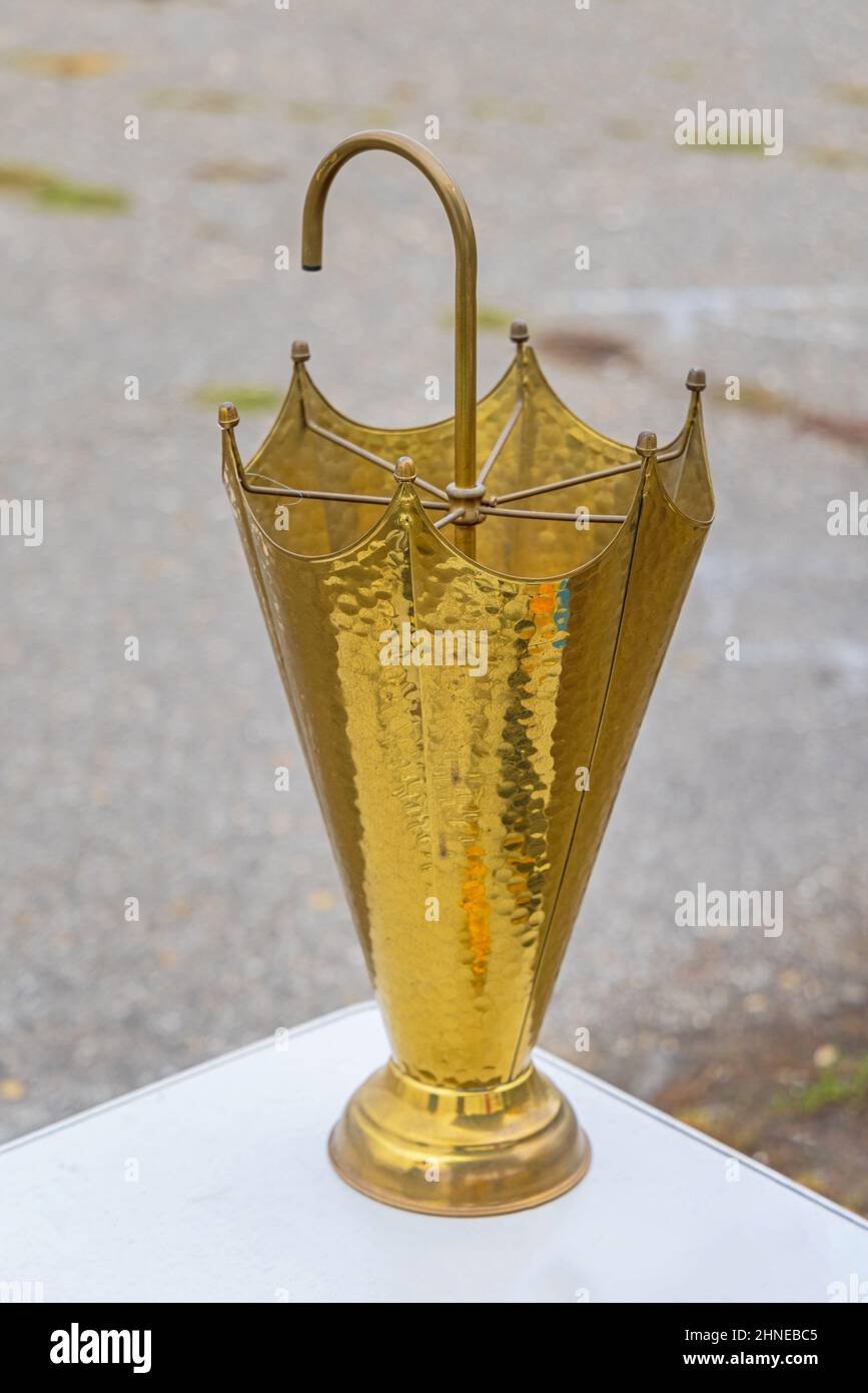 Umbrella Shaped Brass Metal Holder Organizer for Umbrellas Stock Photo