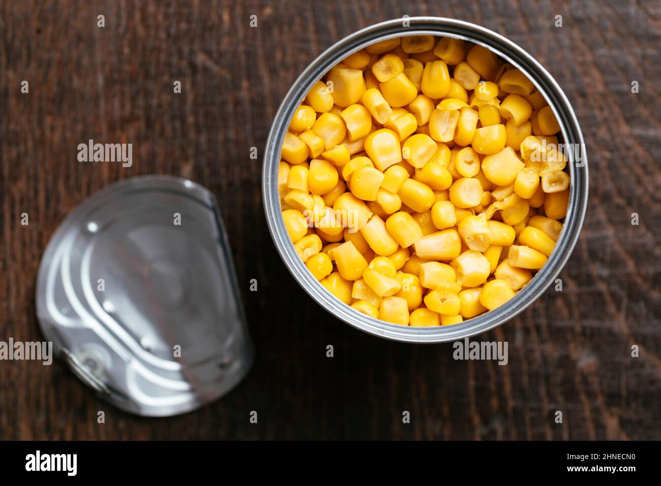Overhead view of an opened can with sweet corn. Stock Photo