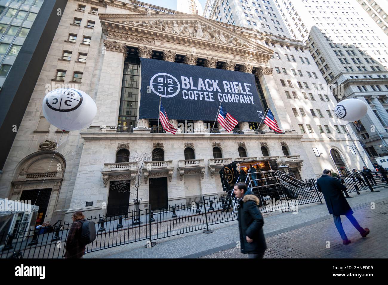 The facade of the New York Stock Exchange is decorated for the listing via a SPAC of Black Rifle Coffee Company on Thursday, February 10, 2022. The veteran owned coffee company merged with the blank check company Silverbox Engaged Merger Corp.via a SPAC. The brand is popular with conservative and gun-rights aficionados. The company is planning to open approximately 78 retail “outposts” by 2023.  (© Richard B. Levine) Stock Photo