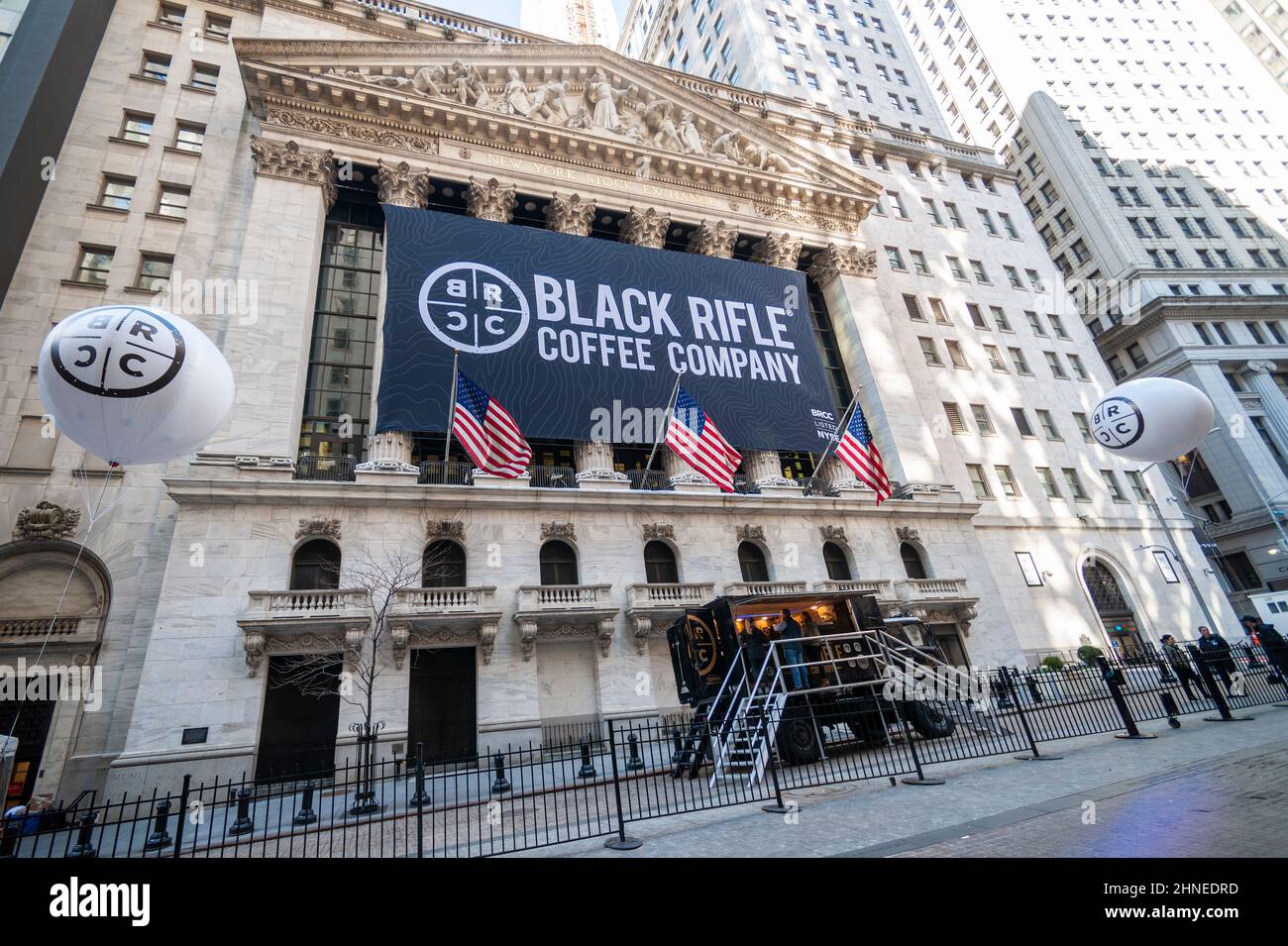 The facade of the New York Stock Exchange is decorated for the listing via a SPAC of Black Rifle Coffee Company on Thursday, February 10, 2022. The veteran owned coffee company merged with the blank check company Silverbox Engaged Merger Corp.via a SPAC. The brand is popular with conservative and gun-rights aficionados. The company is planning to open approximately 78 retail “outposts” by 2023.  (© Richard B. Levine) Stock Photo