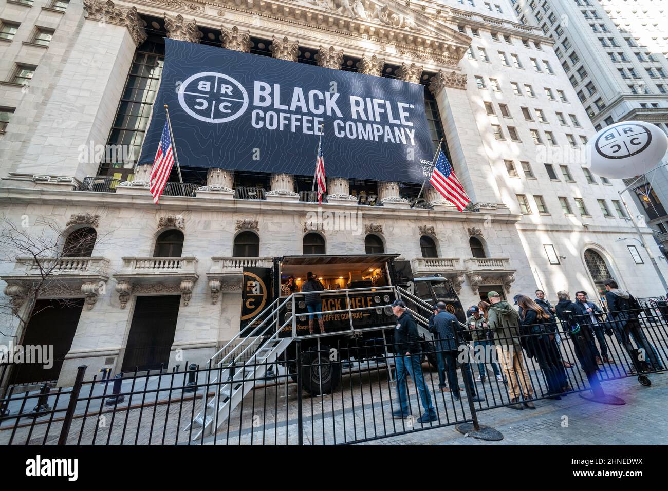 The facade of the New York Stock Exchange is decorated for the listing via a SPAC of Black Rifle Coffee Company on Thursday, February 10, 2022. The veteran owned coffee company merged with the blank check company Silverbox Engaged Merger Corp.via a SPAC. The brand is popular with conservative and gun-rights aficionados. The company is planning to open approximately 78 retail “outposts” by 2023.  (© Richard B. Levine) Stock Photo