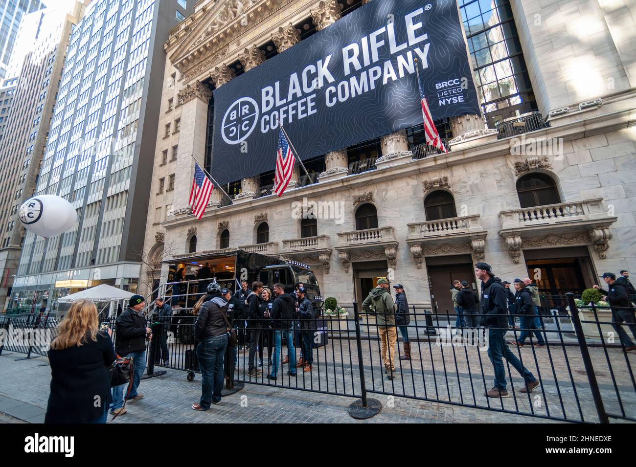 The facade of the New York Stock Exchange is decorated for the listing via a SPAC of Black Rifle Coffee Company on Thursday, February 10, 2022. The veteran owned coffee company merged with the blank check company Silverbox Engaged Merger Corp.via a SPAC. The brand is popular with conservative and gun-rights aficionados. The company is planning to open approximately 78 retail “outposts” by 2023.  (© Richard B. Levine) Stock Photo