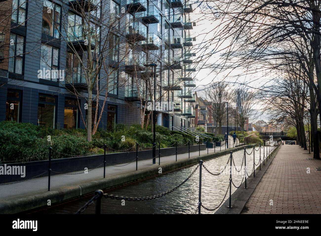 Park vista tower luxury flats along a canal in Wapping, a redeveloped former docks area in Tower Hamlets, London, UK Stock Photo