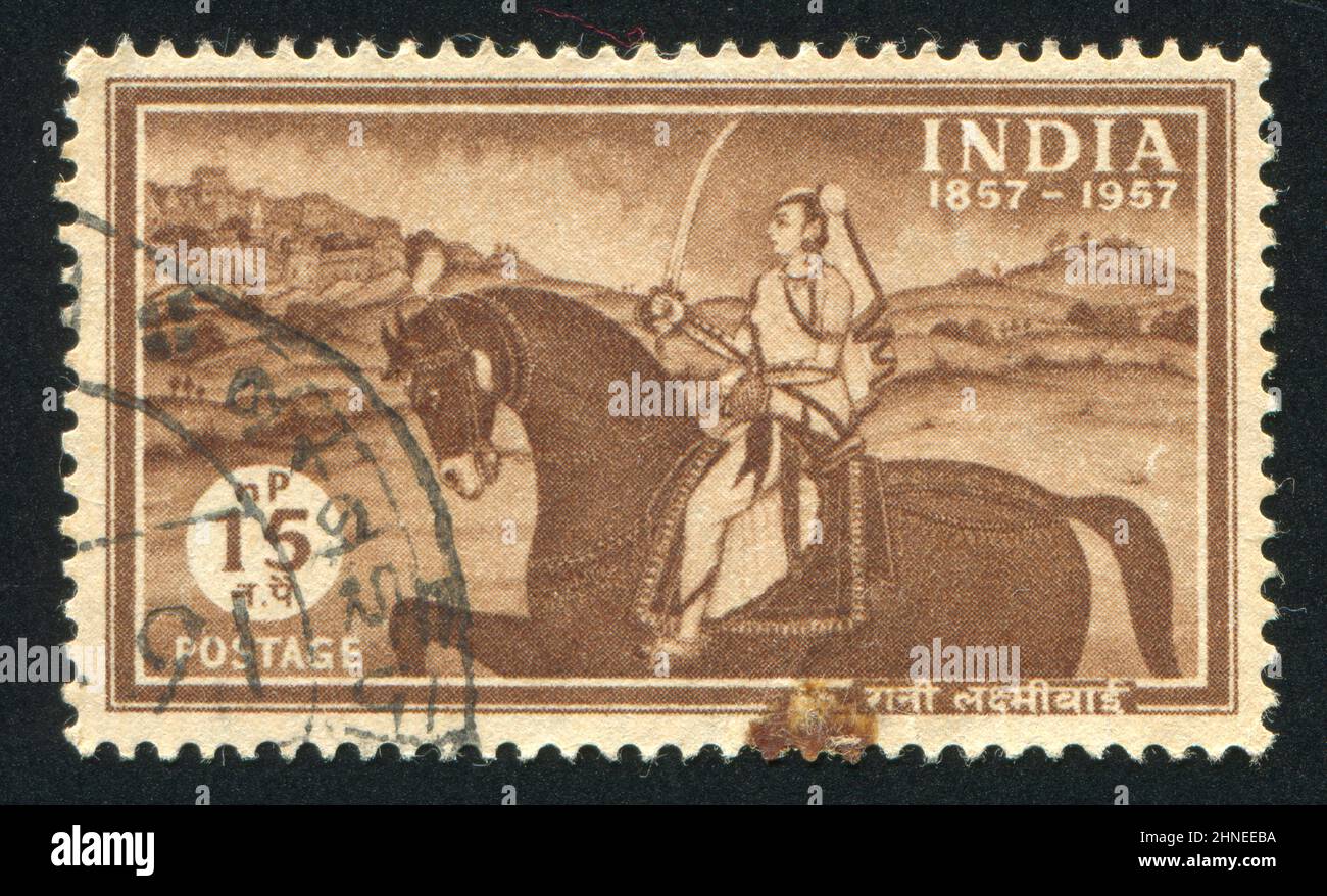 INDIA - CIRCA 1957: stamp printed by India, shows woman on a horse, Laxmibai, Rani of Jhansi, circa 1957 Stock Photo