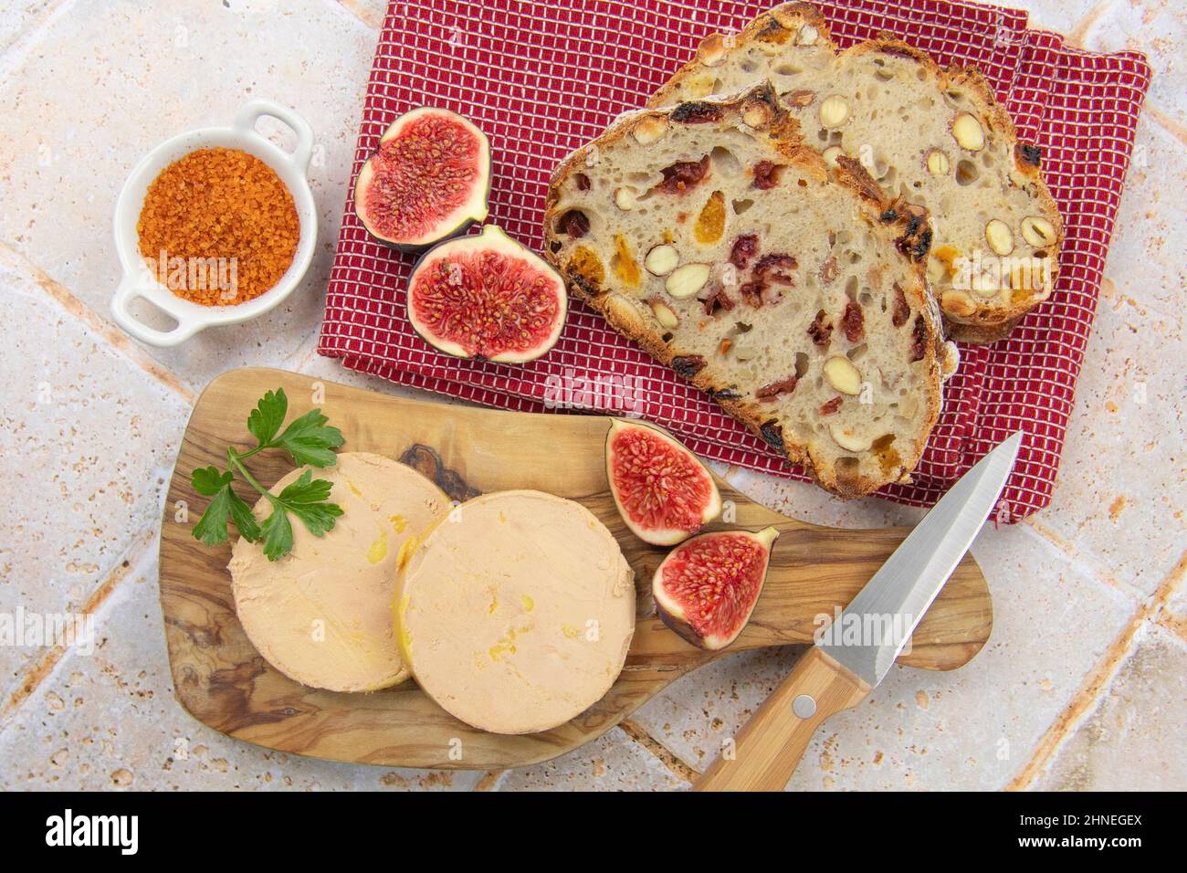 foie gras accompanied by dried fruit bread with fresh figs Stock Photo