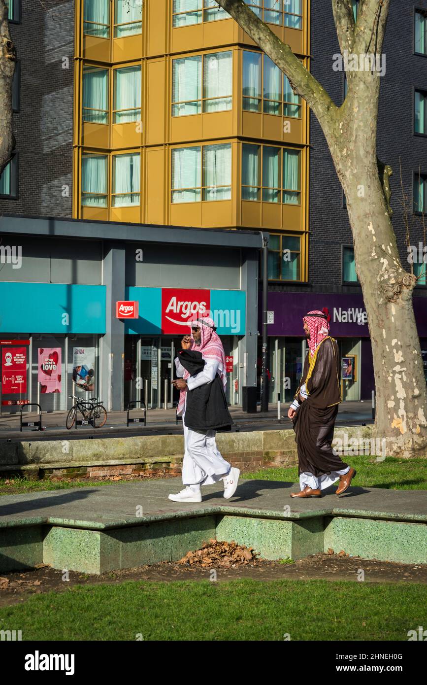 Two Saudi Arab men, Altab Ali Park, formerly known as St Mary's Park, Whitechapel Road, Tower Hamlets, London, UK Stock Photo