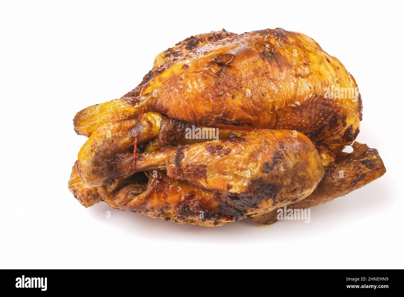 whole roast chicken on a white background Stock Photo - Alamy