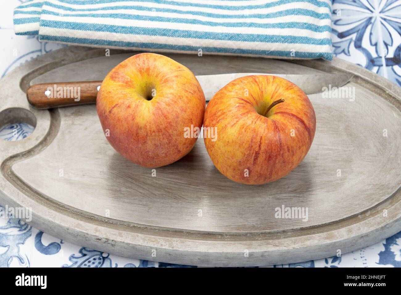 apples on a gray wooden board Stock Photo