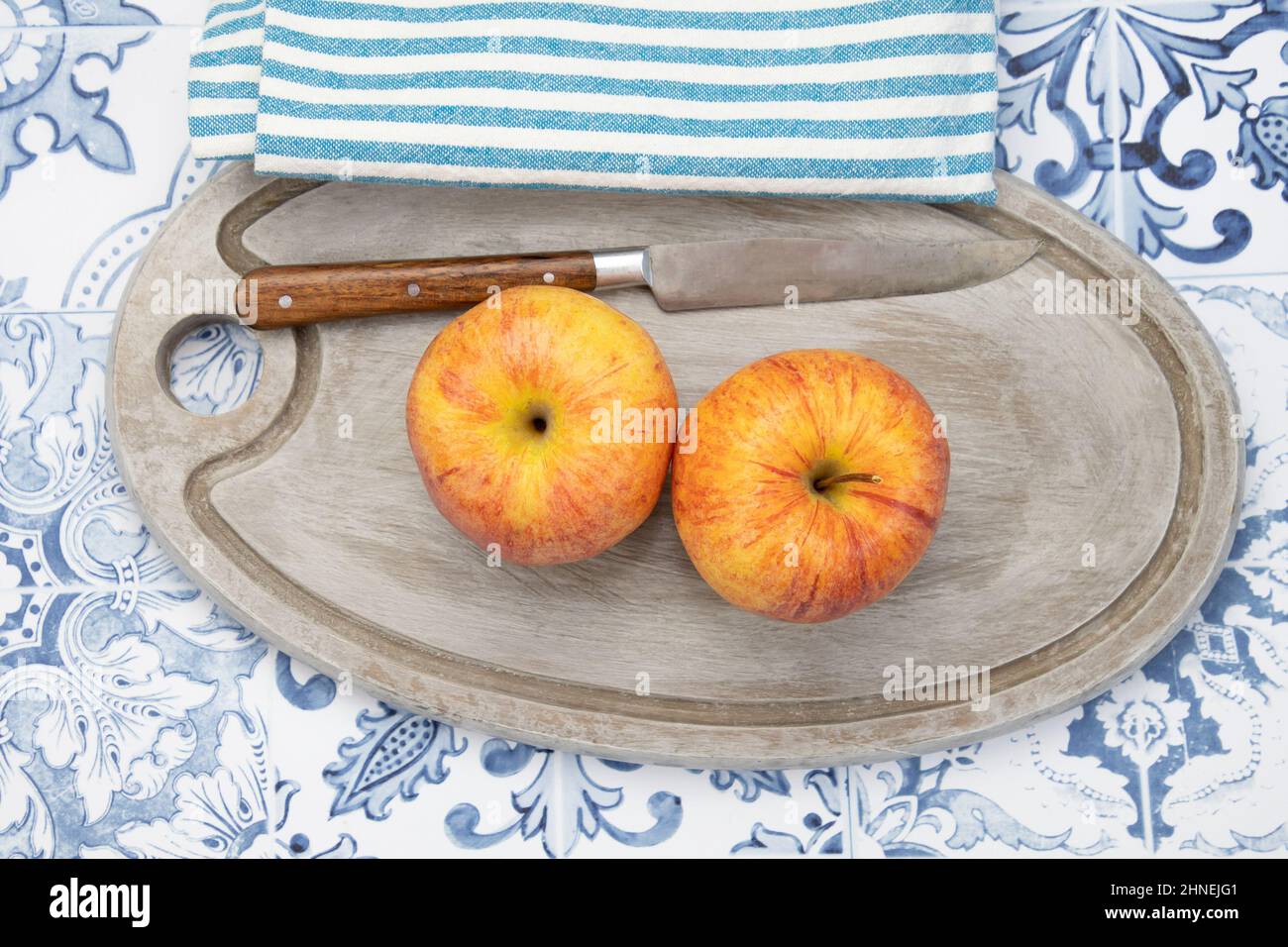 apples on a gray wooden board Stock Photo