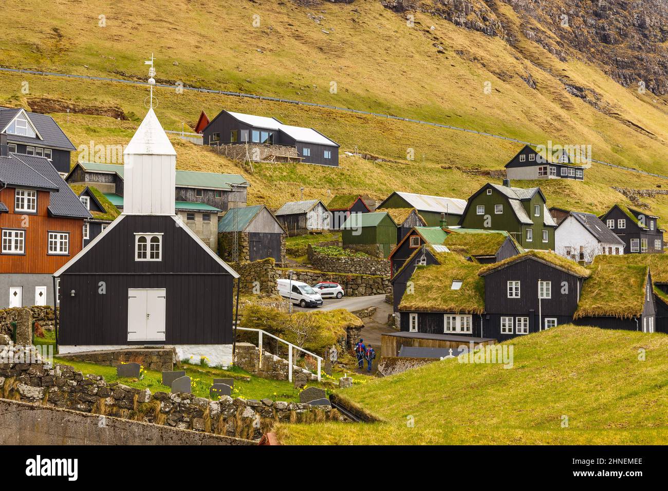 Bour, Faroe Islands - 30 April 2018: View of the wooden church in Bour on Vagar island. A small village situated on the slope of a hill. Faroe Islands Stock Photo