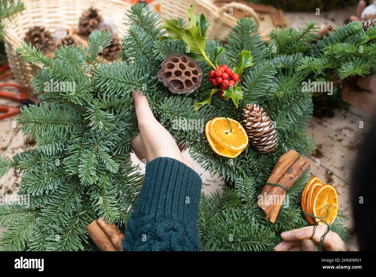 christmas wreath making Stock Photo Alamy