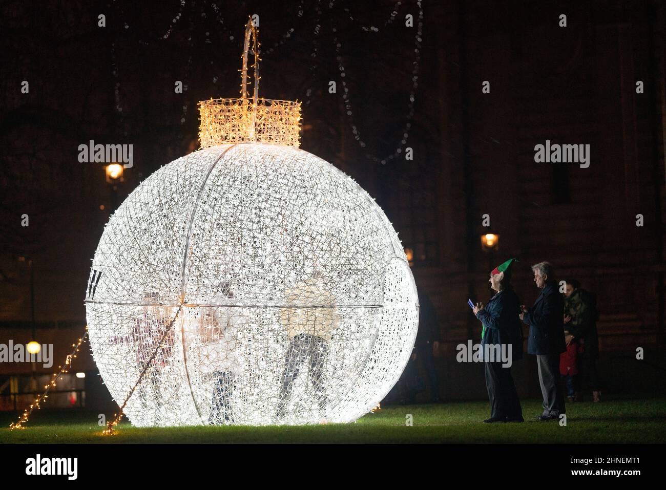 Giant Christmas bauble outside the Queen Elizabeth II Centre, Westminster, London Stock Photo