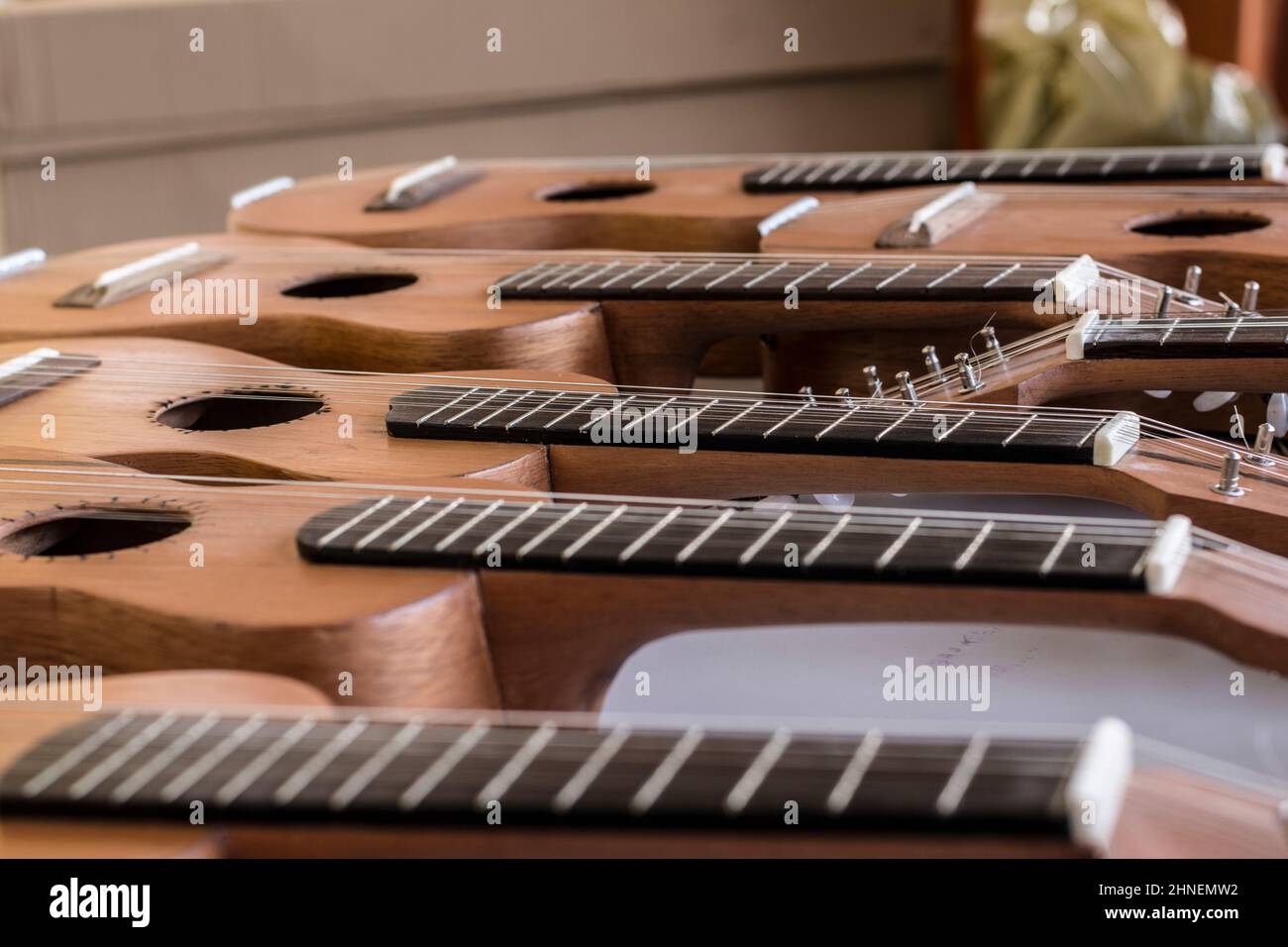 String instruments on top of a table. Saubara, Bahia, Brazil. Stock Photo