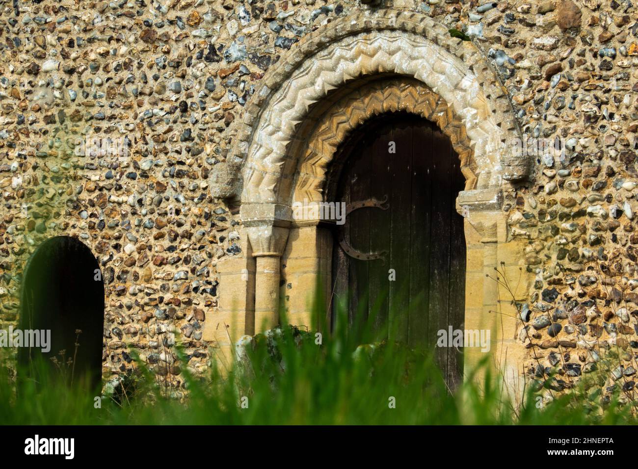 Norman doorway arch, St Mary the Virgin Church, Gissing Stock Photo