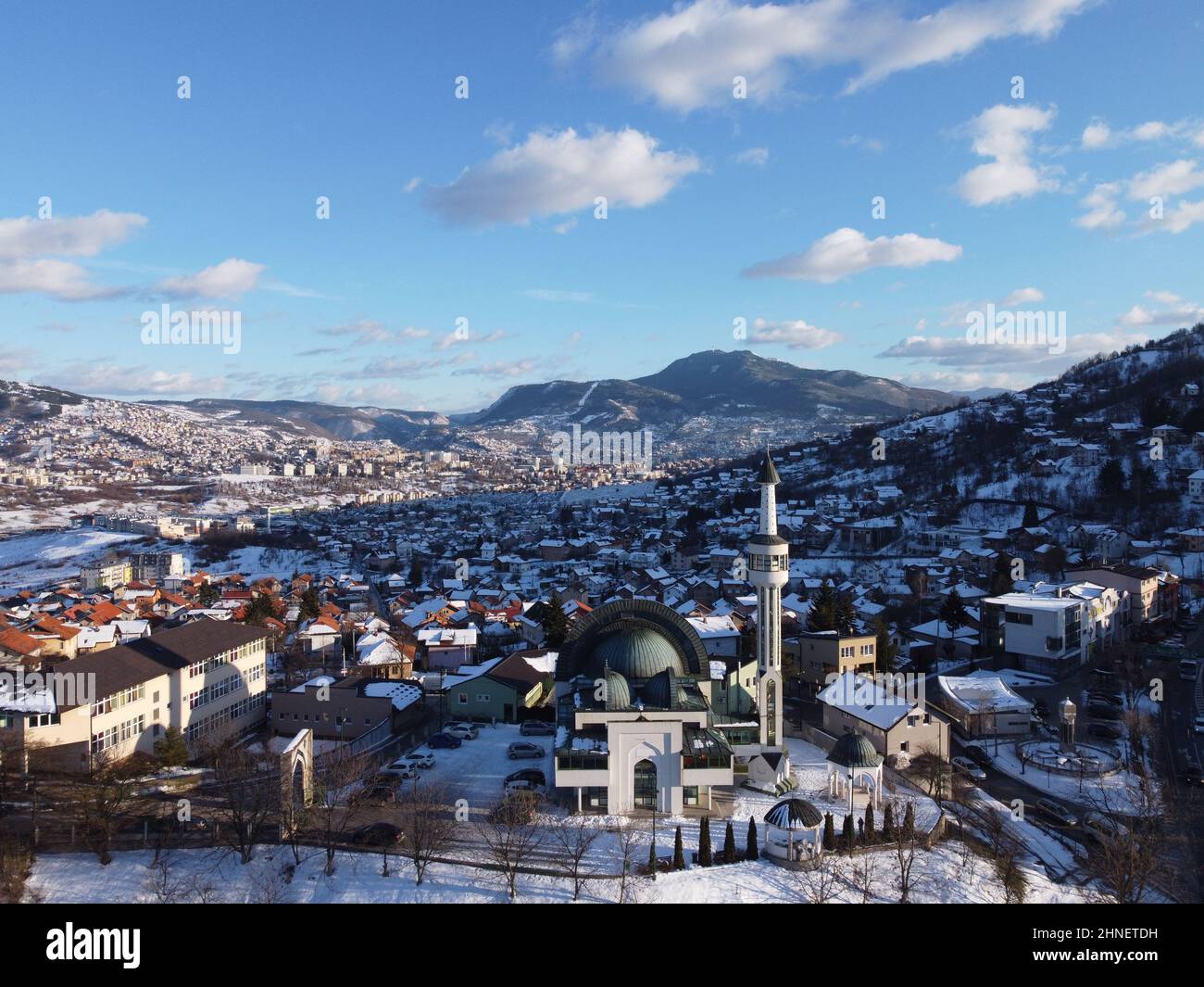 Aerial shot of the cityscape view of Sarajevo covered with the snow in