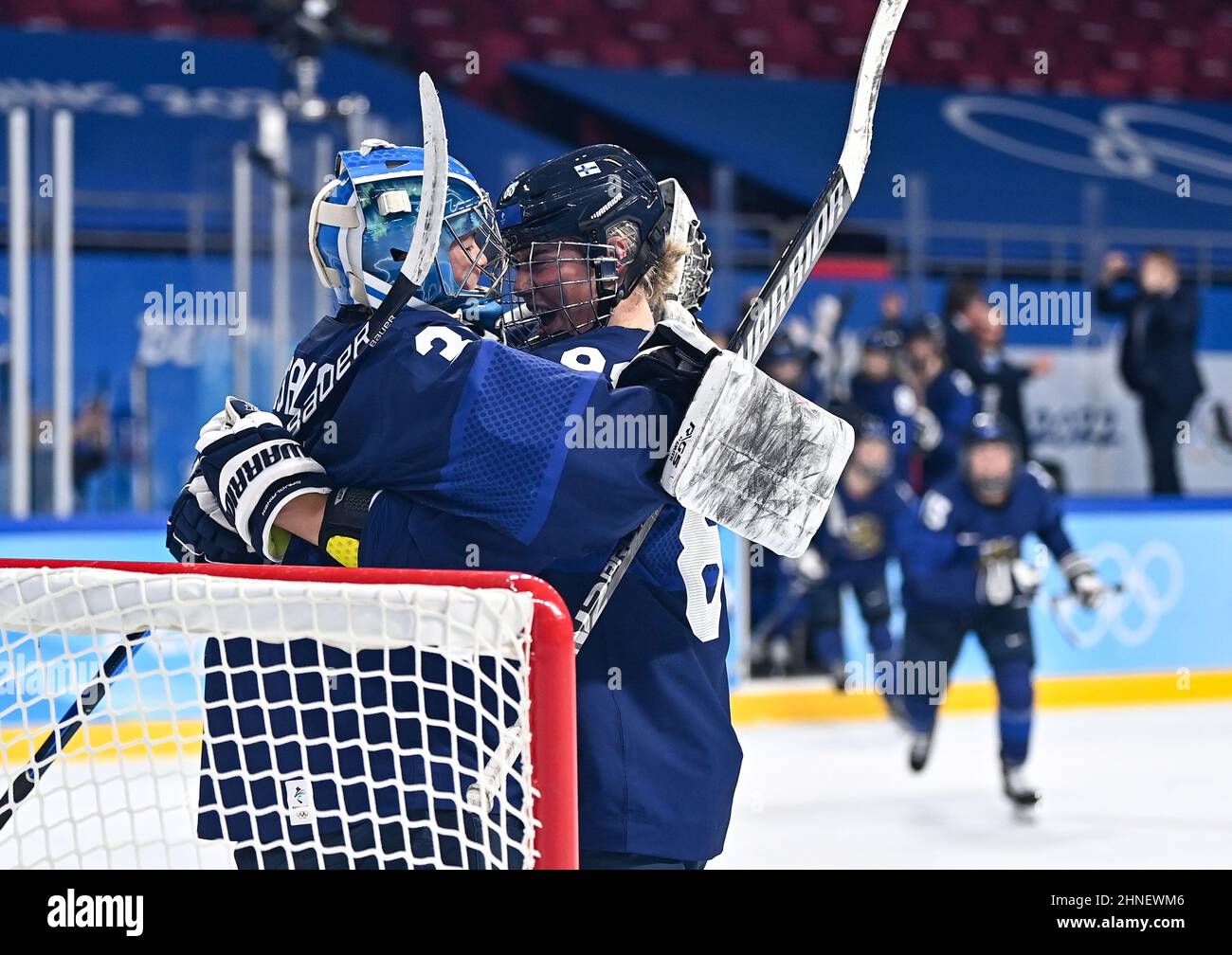 Beijing, China. 16th Feb, 2022. Goalkeeper Anni Keisala (L) of Finland celebrates with her teammate Ronja Savolainen after winning the ice hockey women's bronze medal game of Beijing 2022 Winter Olympics between Finland and Switzerland at Wukesong Sports Centre in Beijing, capital of China, Feb. 16, 2022. Credit: Song Yanhua/Xinhua/Alamy Live News Stock Photo