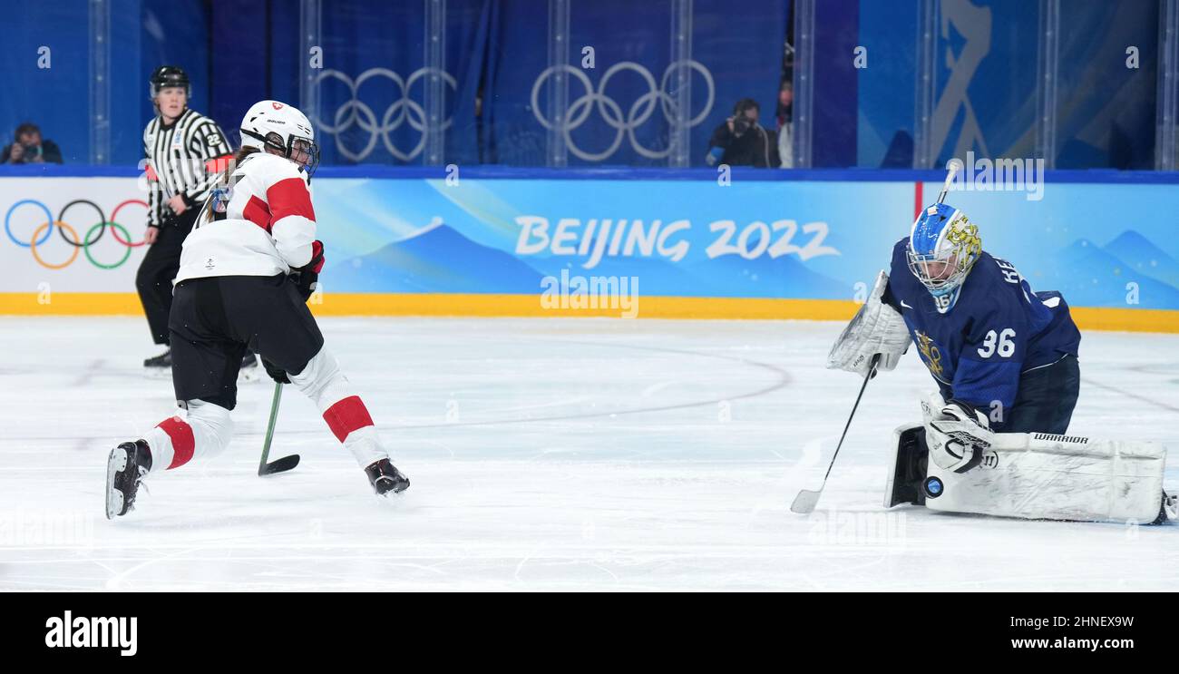 Beijing, China. 16th Feb, 2022. Goalkeeper Anni Keisala (R) of Finland makes a save during the ice hockey women's bronze medal game of Beijing 2022 Winter Olympics between Finland and Switzerland at Wukesong Sports Centre in Beijing, capital of China, Feb. 16, 2022. Credit: Wang Jianwei/Xinhua/Alamy Live News Stock Photo