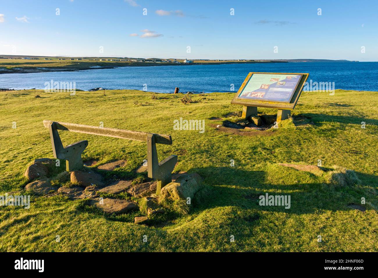 Damaged bench and information sign at the Ness of Duncansby, between John o'Groats and Duncansby Head, Caithness, Scotland, UK Stock Photo