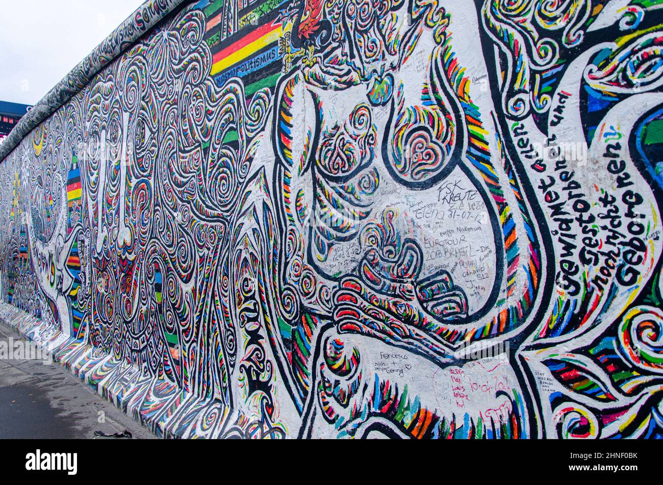Historical colorful graffiti Berlin wall in Germany Stock Photo - Alamy