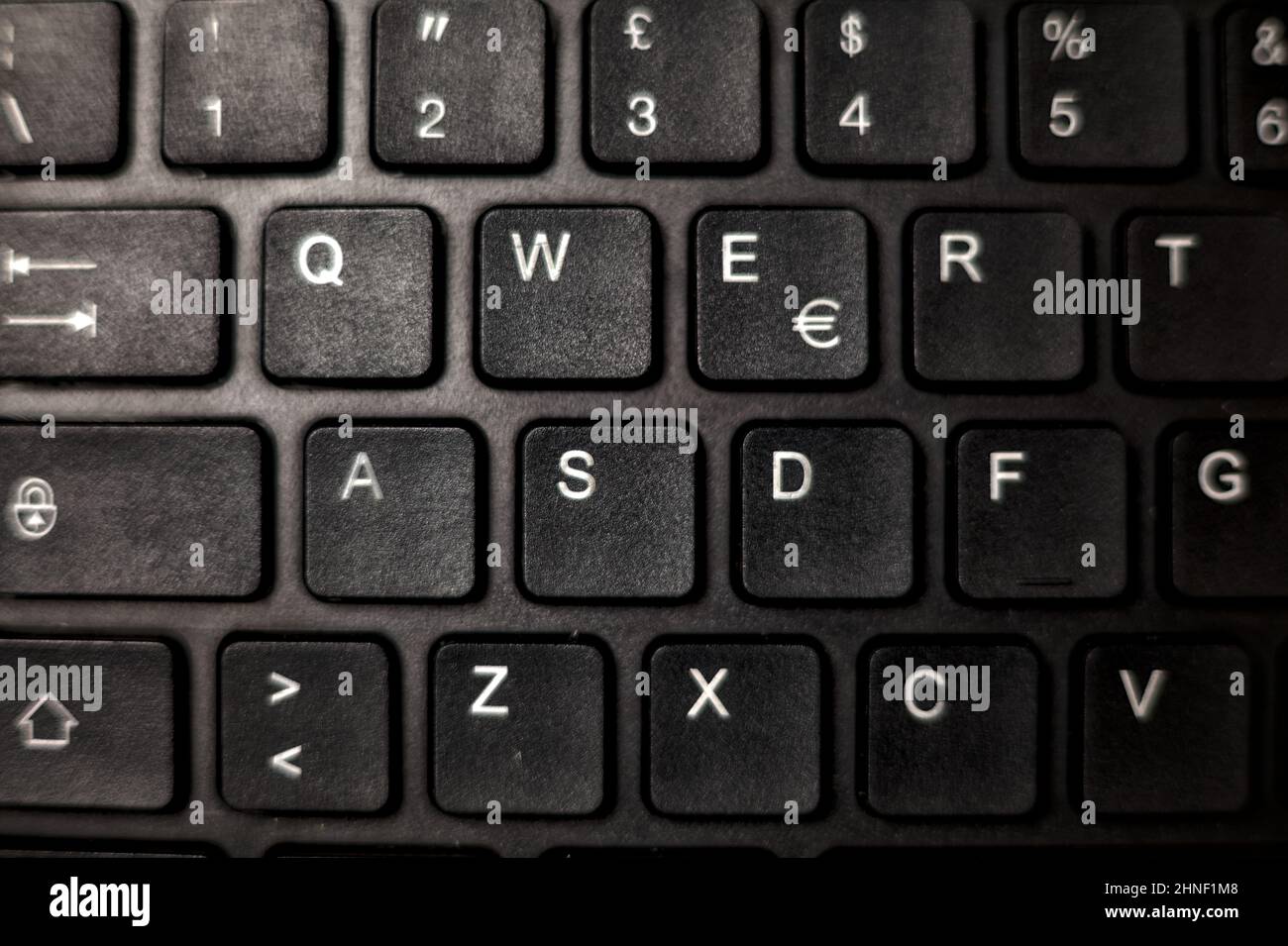 Computer keyboard on a desk seen up close Stock Photo - Alamy