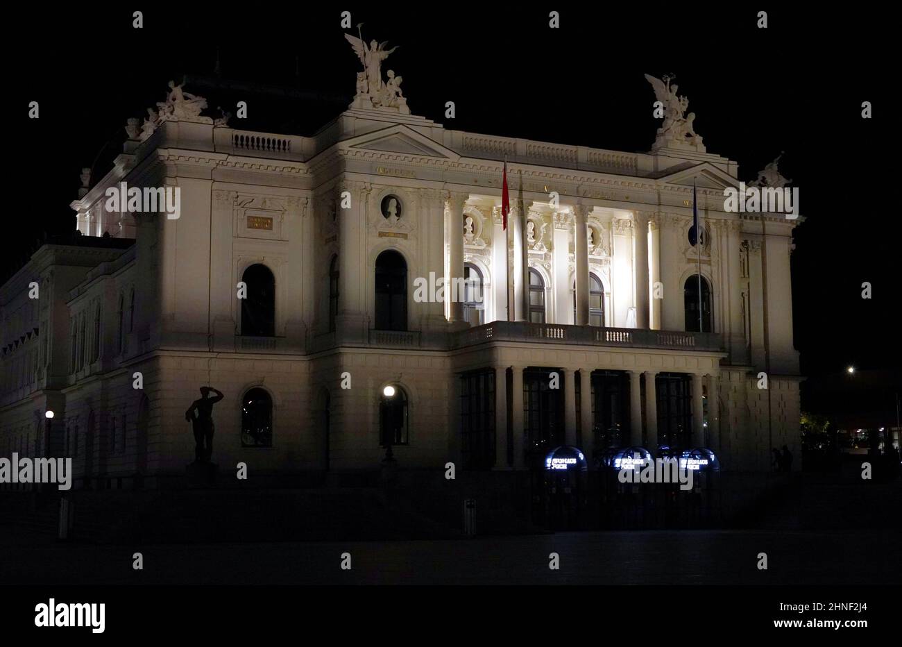 Opera building at the night time. It is enlightened landmark in the city center. Stock Photo