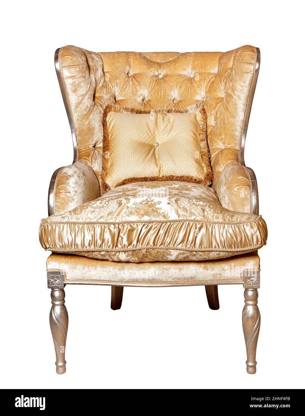 Luxurious upholstered armchair with brocade silver upholstery, isolated on a white background. Stock Photo