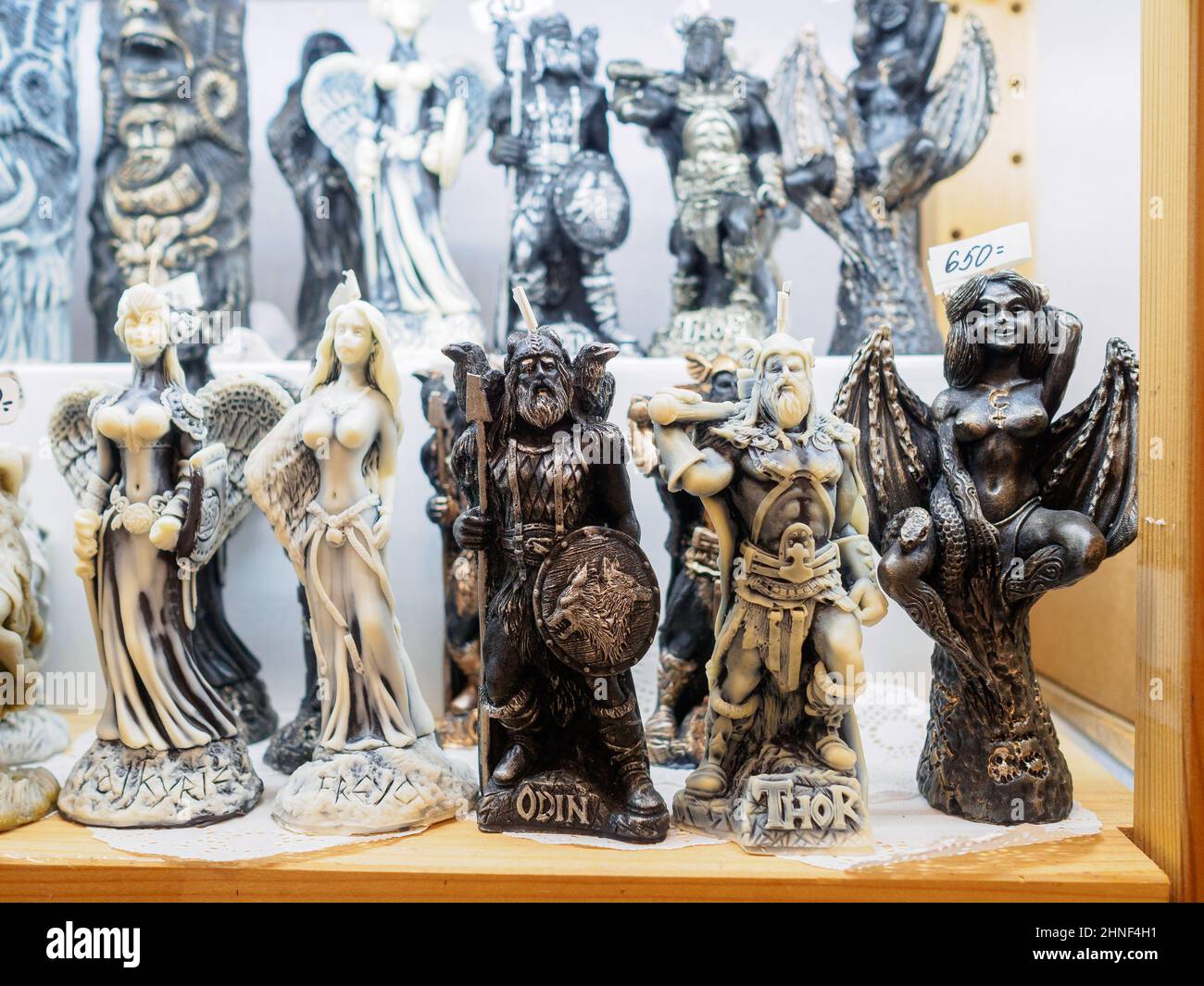 Moscow. Russia. February 14, 2022. Handmade candles in the form of Scandinavian gods on a shelf in a store. Selective focus. High quality photo Stock Photo