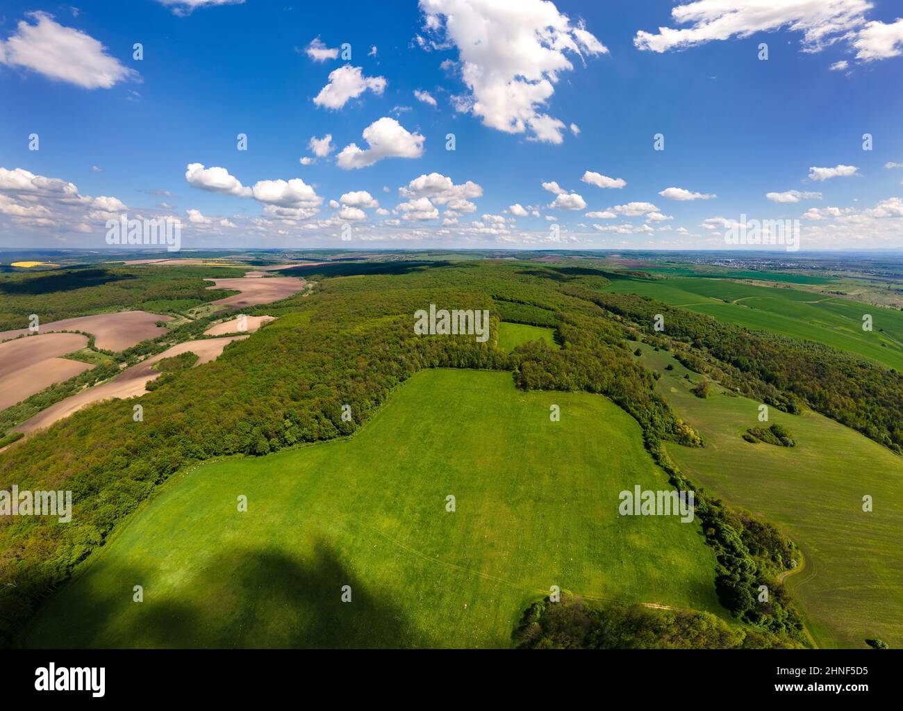 Aerial landscape view of green cultivated agricultural fields with ...