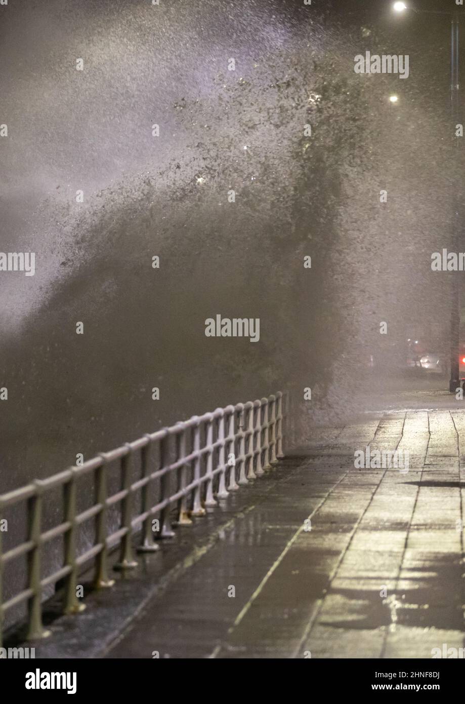 Aberystwyth, Ceredigion, Wales, UK. 16th February 2022  UK Weather: A windy night in Aberystwyth, as storm Dudley combines with a high tide, bringing rough seas crashing against the promenade. © Ian Jones/Alamy Live News Stock Photo