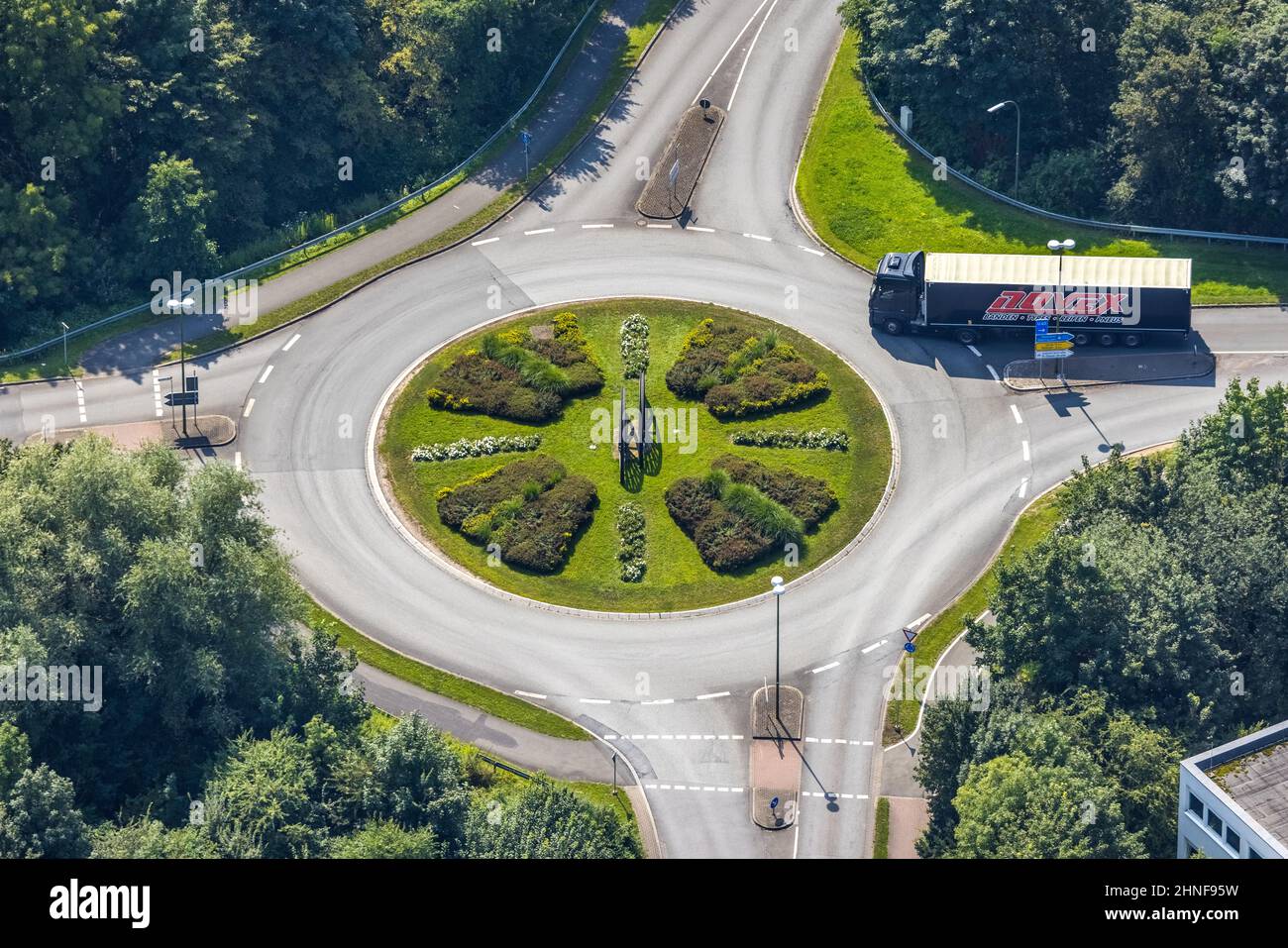 Aerial view, roundabout Rhynerner Straße at the industrial park InlogParc in Westerbönen, truck in the roundabout, Bönen, Ruhr area, North Rhine-Westp Stock Photo