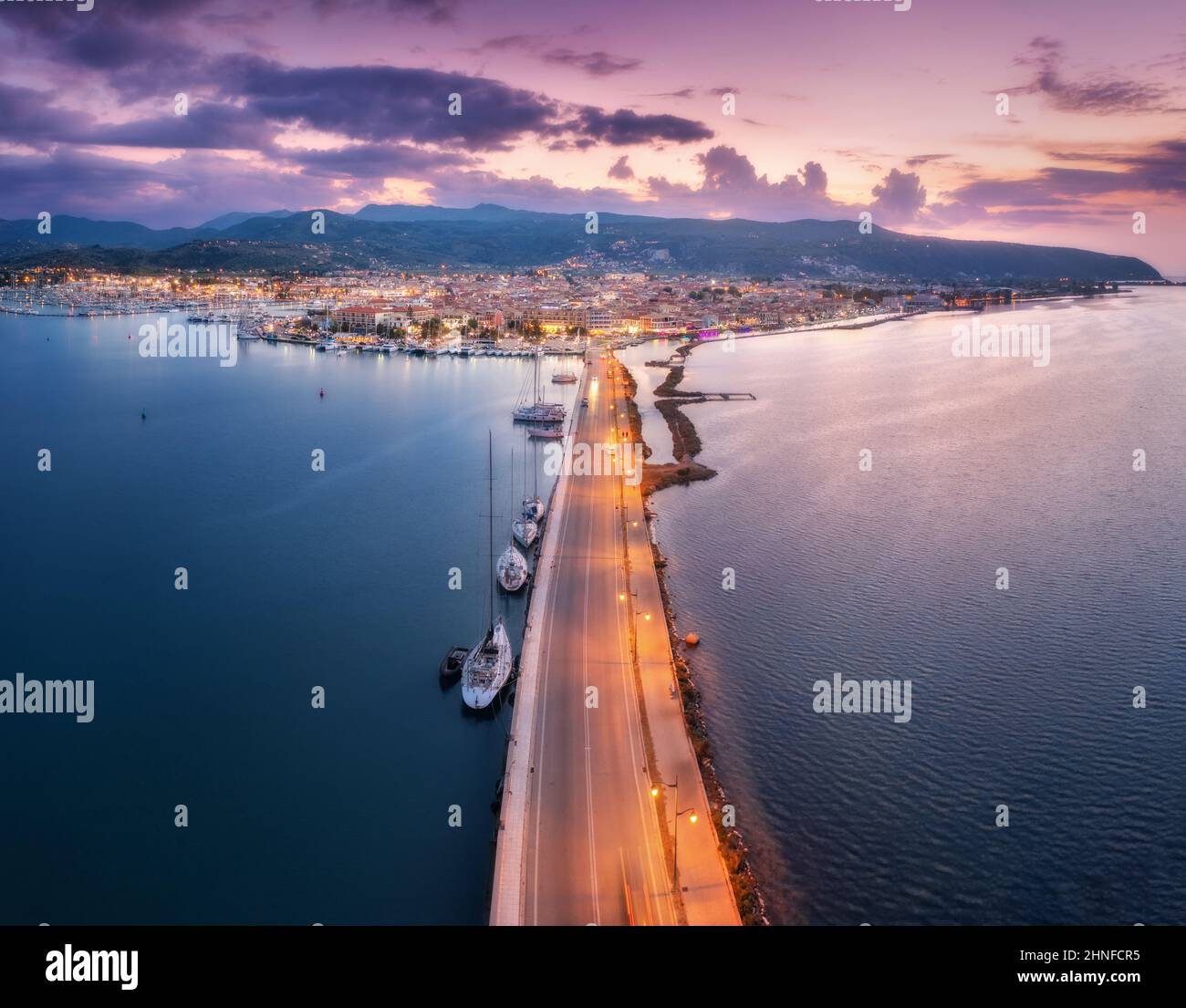 Aerial view of road and sea at night in Lefkada island, Greece Stock Photo