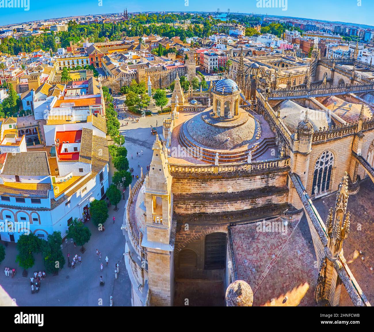 Aerial panorama of Casco Antiguo landmarks from Giralda tower, overlooking dome and Gothic towers of Cathedral, Plaza del Triunfo (Triumph Square), Al Stock Photo