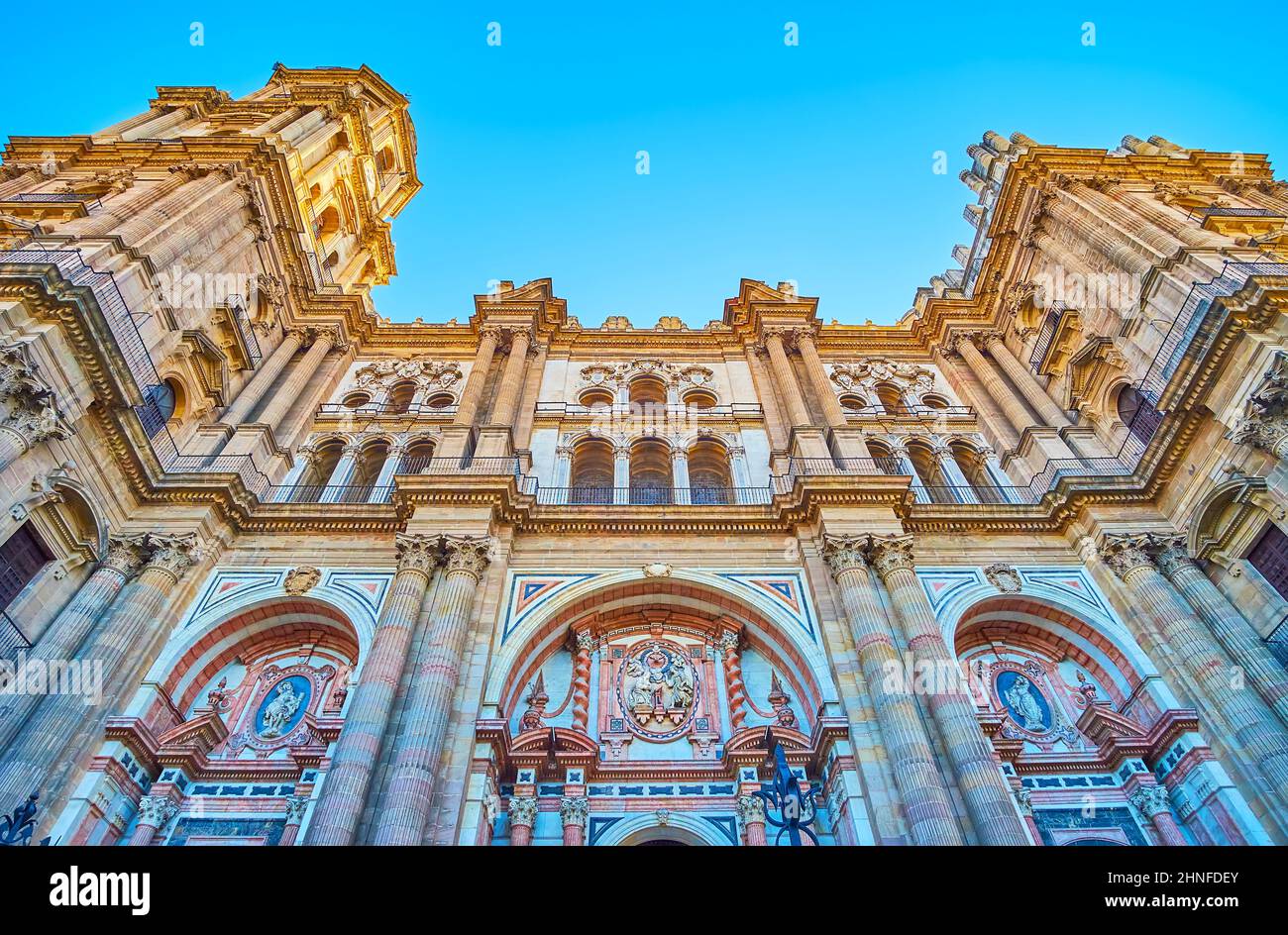 details-of-the-carved-stone-facade-of-malaga-cathedral-with-arches