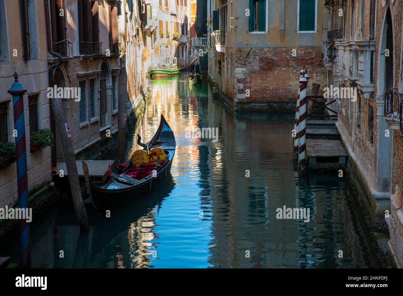 Reflections on water in side canal , Venice Stock Photo